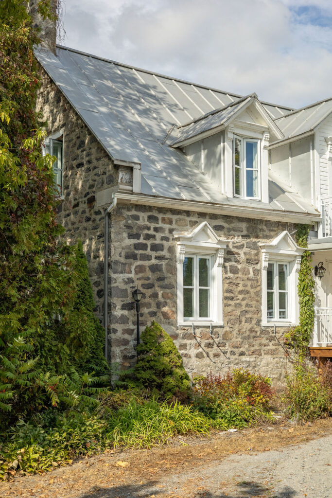 Stone building at Auberge du Manoir with dormer windows