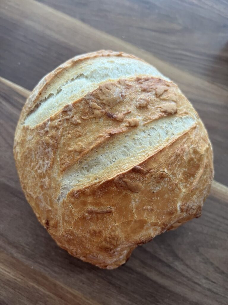 Bread served on a wooden board.